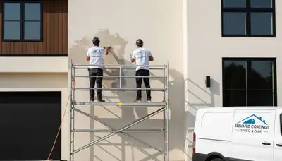 Technician repairing stucco wall on Denver CO home, expert exterior restoration for lasting curb appeal